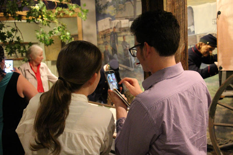 Katherine Boyle (left) and Ben Israel come up with a hashtag while exploring the Civil War Medicine Museum.