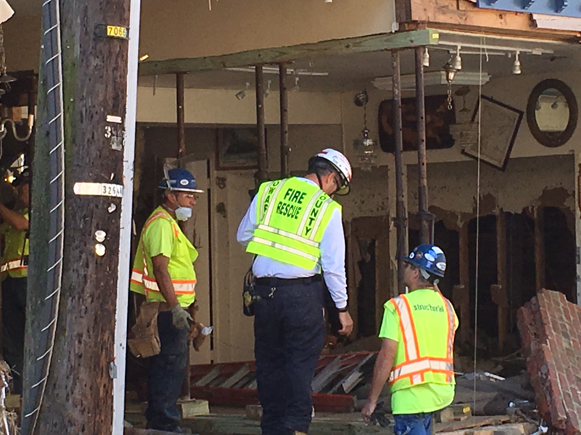 Emergency stabilization of buildings 8111-8113 Main Street, August 7, 2016