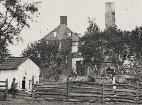 Burned ruins of Mumma Farm.