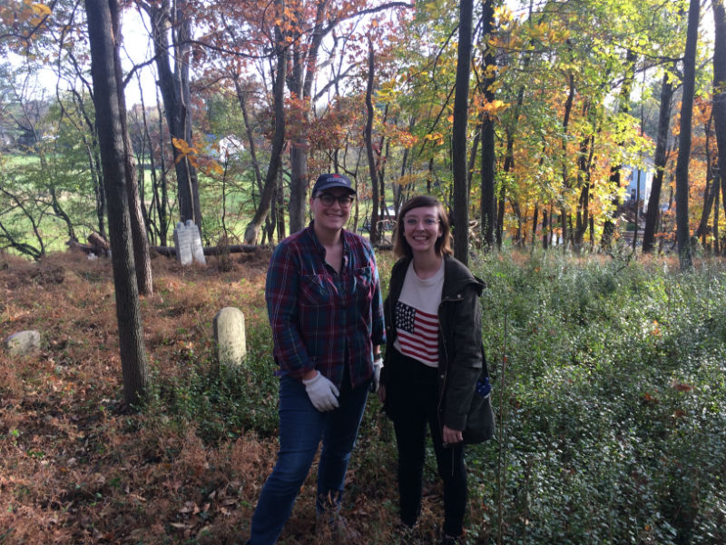 Image of Meagan Baco and Michelle Eshelman from Preservation Maryland at Oella Cemetery.