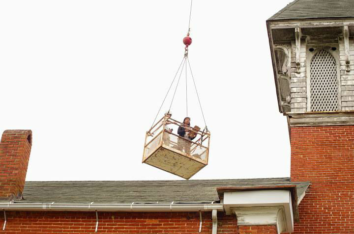 Nakita Reed, architect, inspects an historic church on the Eastern Shore.