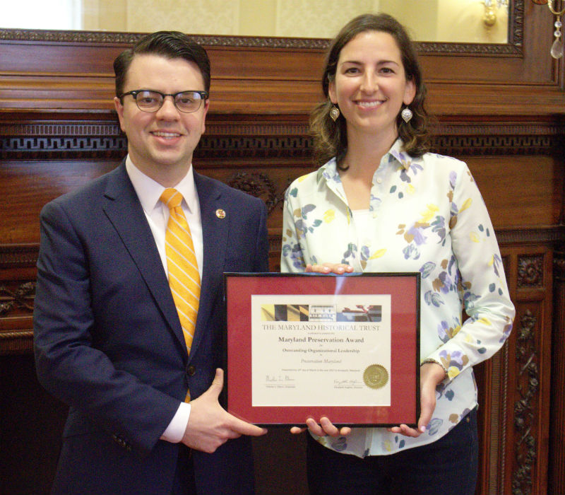 Nicholas Redding and Renee Novak (Resource Center Field Director) accept an award from the Maryland Historical Trust for the organization's response to the 2016 flood.