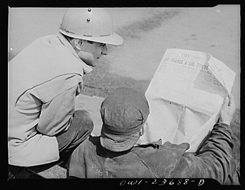 Workers at the Bethlehem-Fairfield shipyards reading The Sun, 1943. Photo from the Library of Congress.