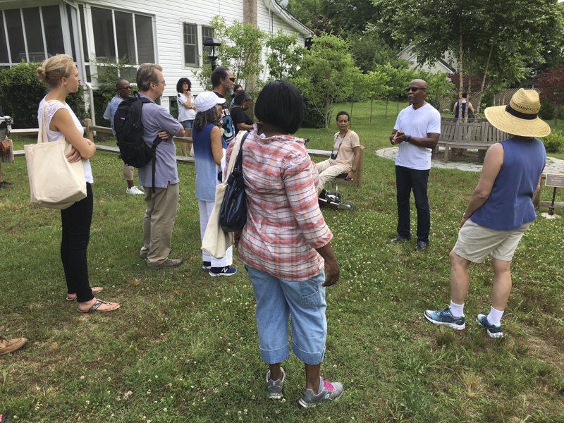 The community reclaimed an empty lot as a rain garden.