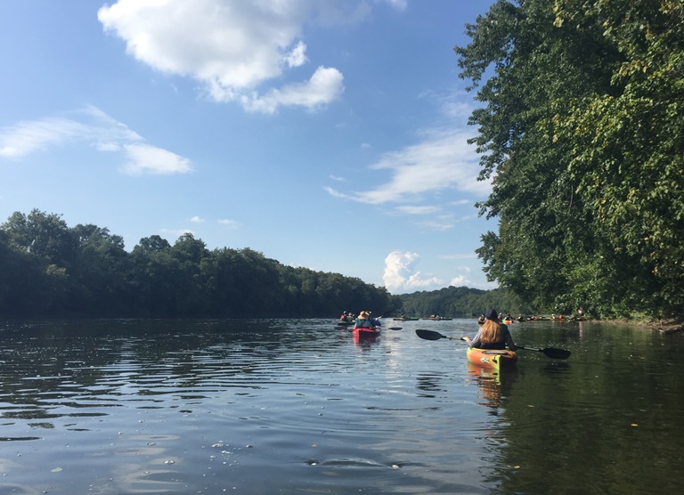 Kayaks arriving at the destination on the placid waters of the Potomac River.