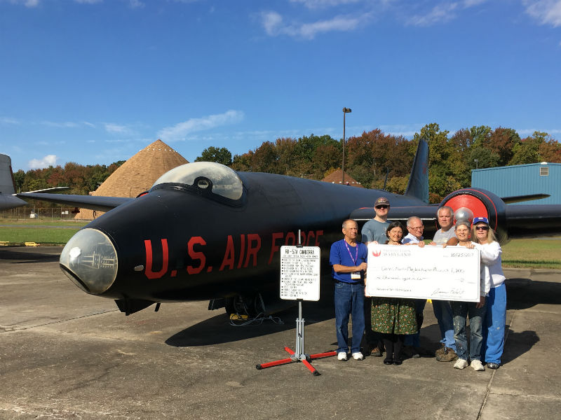 Grant check presentation at the airfield, 2017.