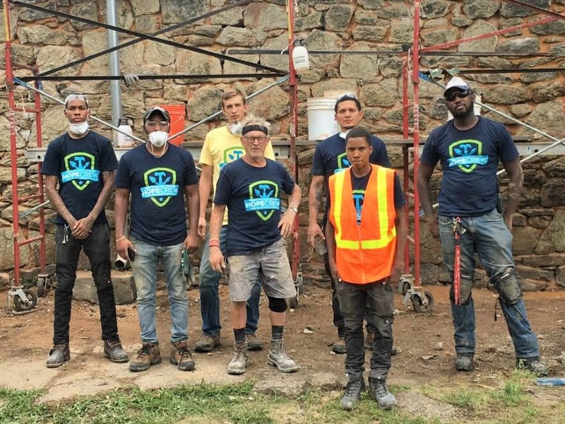 David Gibey, center, with HOPE Crew members.