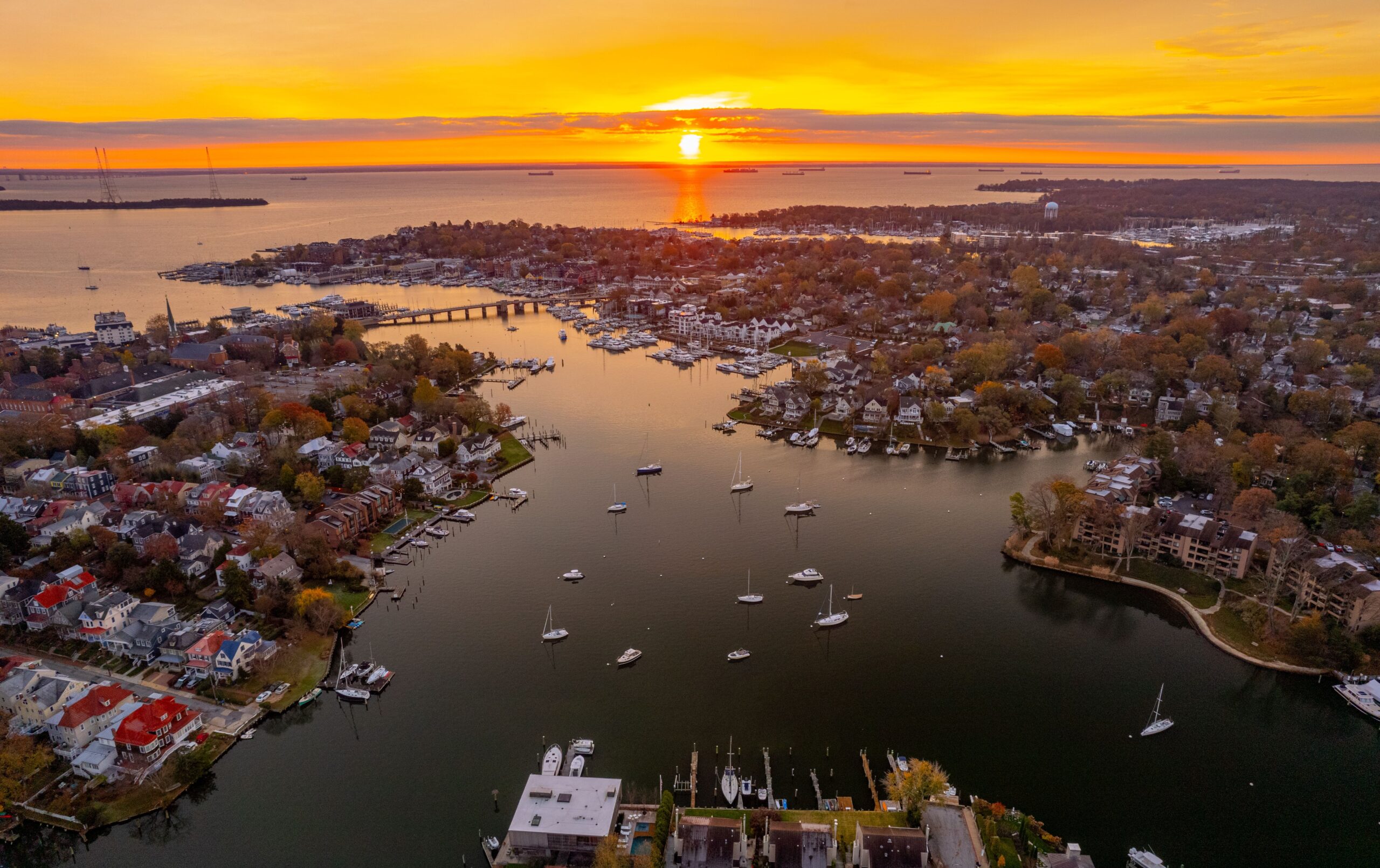 Aerial shot of Annapolis harbor and Chesapeake Bay at sunset.